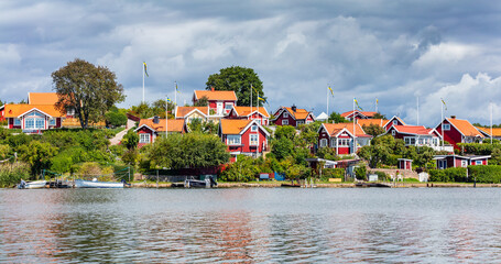 Scandinavian traditional houses in Karlskrona on Baltic sea coast, Sweden. Brandaholm neighbourhood - 748752524
