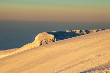 Golden Sunrise Over Kilimanjaro’s Majestic Glacier