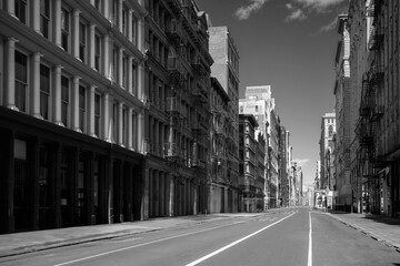 Fototapeta na wymiar New York City Retro-style Architectural Street Landscape with high rising landmark buildings in the historic district of Soho, Lower Manhattan, USA