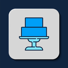 Filled outline Wedding cake icon isolated on blue background. Vector