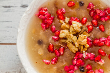 Traditional Turkish Ashure Pudding, Garnished with Pomegranate Seeds and Nuts, A Special Dish for Muharram