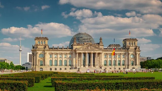 BERLIN, GERMANY - MARCH 1, 2024: Timelapse hyperlapse view of Berlin Reichstag, famous historical social touristic historical landmark.