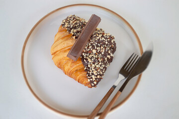 Delicious dessert chocolate croissant for breakfast
