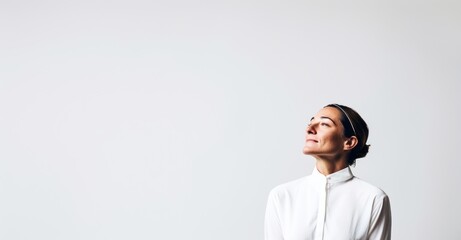 Obraz premium Serene contemplation in a professional portrait on white.