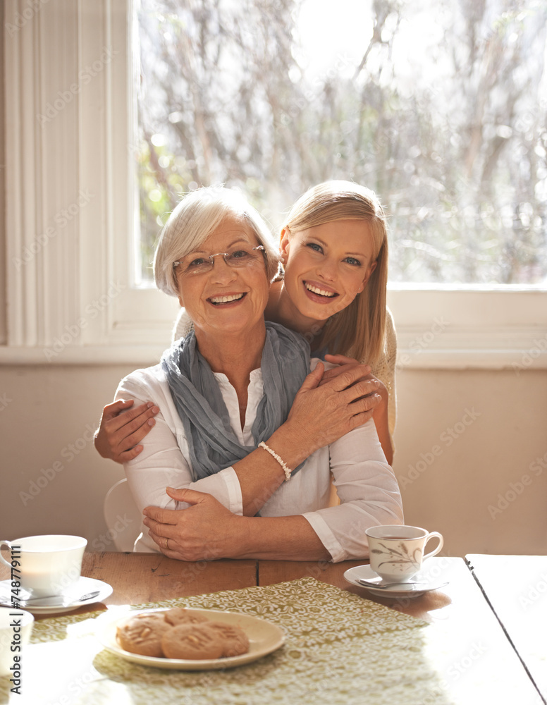 Poster Family home, retirement and daughter hug mom for breakfast in dining table, coffee and snacks. Female person, smile and happiness with mother in house, elderly and visit from girl, tea and biscuits