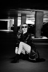 woman in leather coat