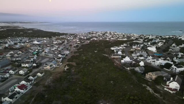 South African beautiful village Arniston embedded in Sand Dunes and a turquoise sea coast line