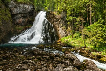 A romantic Golling Waterfall in Austria in the early summer in the middle of a forest