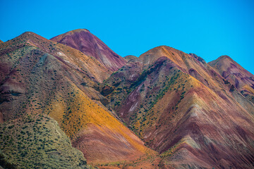 Earthen Hues: Sloping Peaks of the Rainbow Mountains in Northwest Iran