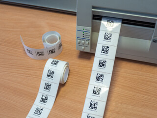Printing labels with QR code. Thermal transfer label printer. Inventory of units in warehouses and...