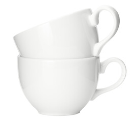 Closeup pile of clean shiny ceramic Coffee cups in a stack isolated clipping path on white background.