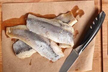 Pickled herring. Salted, soused skinless fillets of fish Clupea.