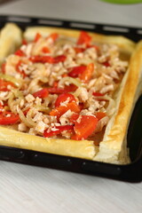 Filling in pastry case. Making Chicken and Egg Galette Series.