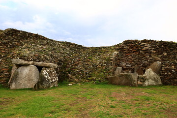The Cairn of Barnenez is a Neolithic monument located near Plouezoc'h, on the Kernéléhen peninsula in northern Finistère, Brittany