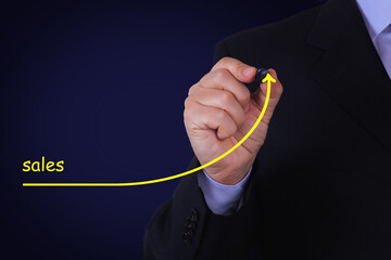 Businessman draw growing line symbolize growing Sales
