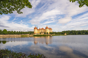 The famous Moritzburg castle, park, castle above the lake, lake reflection in the water, German...