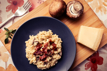 Mushroom risotto with parmesan cheese set on a table