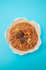 typical portuguese dish with beans and smoked sausages