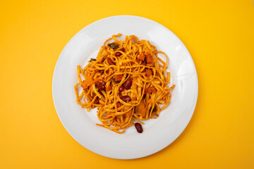 Noodles Tai style mixed with spicy tomatoes and meat