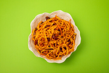 Noodles Tai style mixed with spicy tomatoes and meat