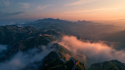 An awe-inspiring sunrise breaks through mist, illuminating the undulating landscape and the Great Wall of China