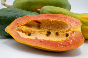 Ripe papaya on a white background