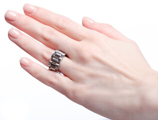 Jewelry silver ring bijouterie female hand on white background isolation