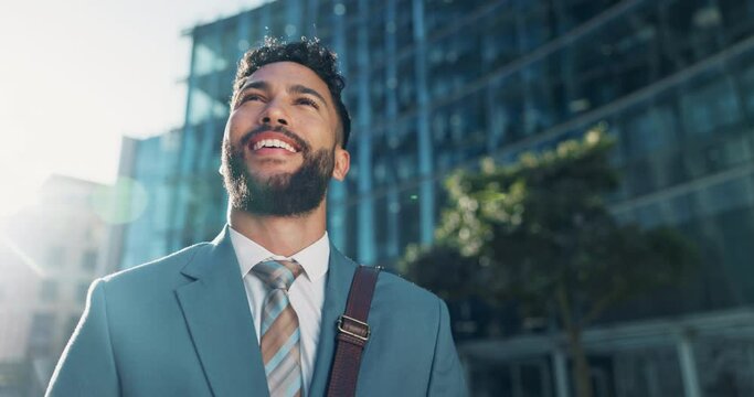 Happy, pride and young businessman in city looking at buildings for corporate office. Smile, professional and male financial advisor standing in town with positive, proud and confident attitude.