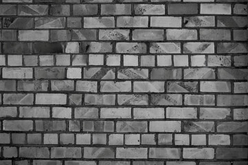 Fototapeta premium old brick wall close up in gray color