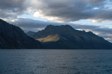 A beautiful breathtaking mountain landscape view along the journey near Lake Wakatipu route in New Zealand trip.