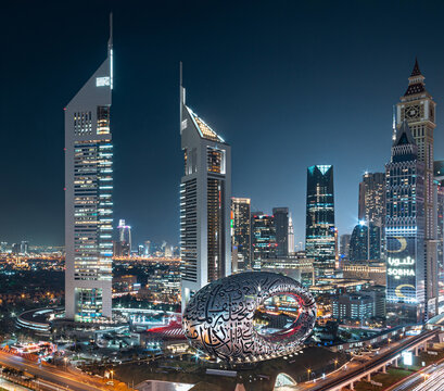  Colorful horizon lights over Dubai towers at night