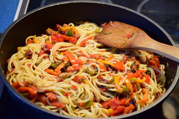 colorful spaghetti with paprika and tomato