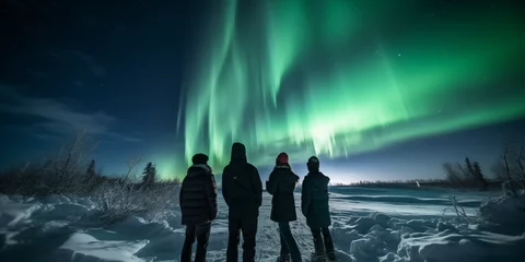 Foto op Plexiglas A group of tourist are watching the northern light aurora borealis at a northern light guided tour  © Erzsbet