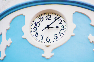 Clock on the fasade of the Hungarian Secessionist Catholic cathedral or the Blue Church in the old town in Bratislava, Slovakia