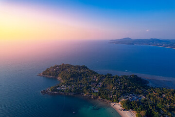 Aerial top view panorama sunset Surin beach with sea of Phuket paradise. Concept tropical travel photo Thailand