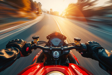 First-person view of rider speed down forest-lined road on sports motorbike, hands clutching the handles with motion blur effect. Concept of speed and adrenaline - obrazy, fototapety, plakaty