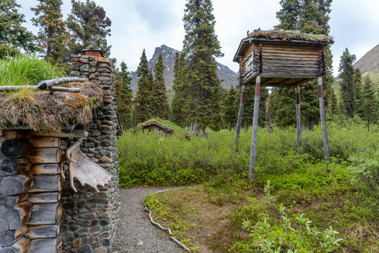 Lake Clark National Park, Alaska: Richard "Dick" Proenneke's food storage cache, log cabin, chimney, woodshed. Small log structure on stilts to keep away animals. 