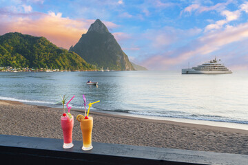 Cocktails with a view  at Soufriere Beach and bay at sunset..Soufriere, Saint Lucia, .West Indies,...
