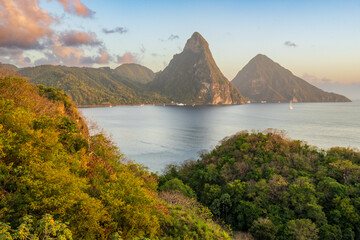 Stunning view of the Pitons (Petit Piton & Gros Piton). from an elevated viewpoint with the rainforest and bay of Soufrire in the foreground...Soufriere,.Saint Lucia, .West Indies, Eastern Caribbean - obrazy, fototapety, plakaty