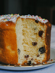 Traditional Easter cake. Panettone. Kulich closeup. Paska, Ukrainian Easter. Orthodox Easter, Homemade cake by grandmother 