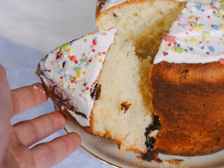 A piece of Easter cake. Kulich closeup. Ukrainian Easter. Orthodox Easter. Panettone, paska