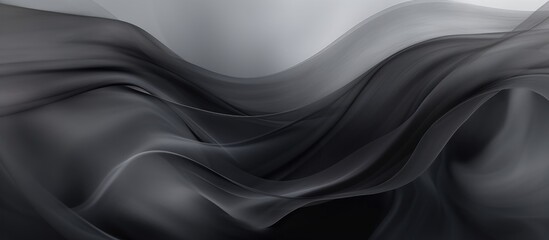 Fototapeta premium A black and white cloth is draped over a surface, creating striking contrasts and textures in the abstract background. The folds and shadows of the cloth add depth and interest to the monochrome