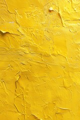 Detailed close-up of a vibrant yellow painted wall. Perfect for backgrounds or texture overlays