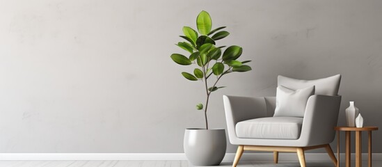 A sophisticated living room featuring a chair and a potted plant on a side table. The room is elegantly decorated with gray furniture and white walls.