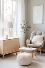 This room features a chair and ottoman, both with sleek designs and neutral colors. The minimalist decor creates a contemporary and inviting space