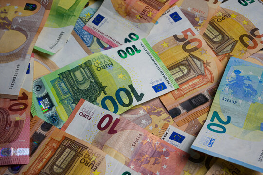 a large pile of euro banknotes - 10, 20, 50, 100 euros