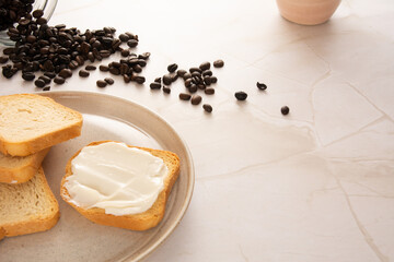 Toast with cream cheese in a marbled background in aerial view mockup