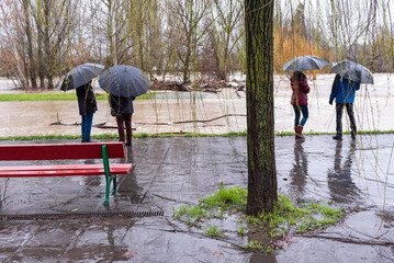 Contemplating the rising river. Arga River. Pamplona, ​​Navarre