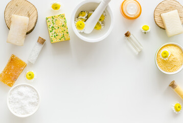 Pharmacy chamomile flowers with herbal cosmetic beauty products