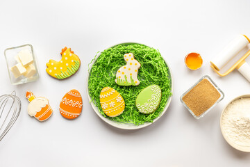 Easter eggs and bunny cookies with ingredients. Baking cooking flat lay